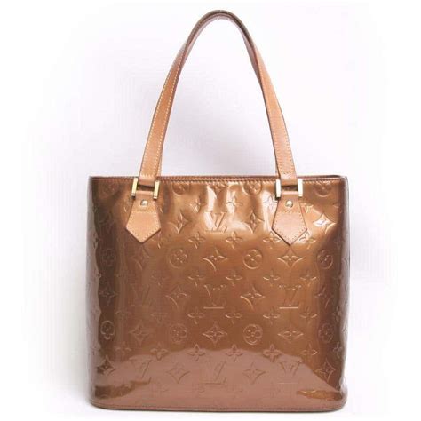 are louis vuitton bags made of leather|Louis Vuitton shiny leather bag.